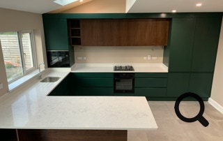 bespoke handelelss kitchen with walnut doors